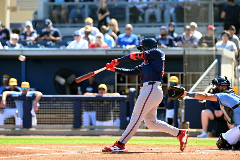 Feb 24, 2024; Port Charlotte, Florida, USA; Atlanta Braves shortstop Ignacio Alvarez (92) hits a two RBI double in the second inning of a spring training game against theTampa Bay Rays at Charlotte Sports Park. Mandatory Credit: Jonathan Dyer-USA TODAY Sports