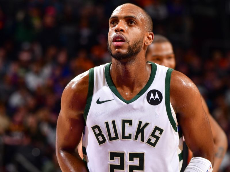 PHOENIX, AZ - FEBRUARY 6:  Khris Middleton #22 of the Milwaukee Bucks shoots a free throw during the game on February 6, 2024 at Footprint Center in Phoenix, Arizona. NOTE TO USER: User expressly acknowledges and agrees that, by downloading and or using this photograph, user is consenting to the terms and conditions of the Getty Images License Agreement. Mandatory Copyright Notice: Copyright 2024 NBAE (Photo by Barry Gossage/NBAE via Getty Images)