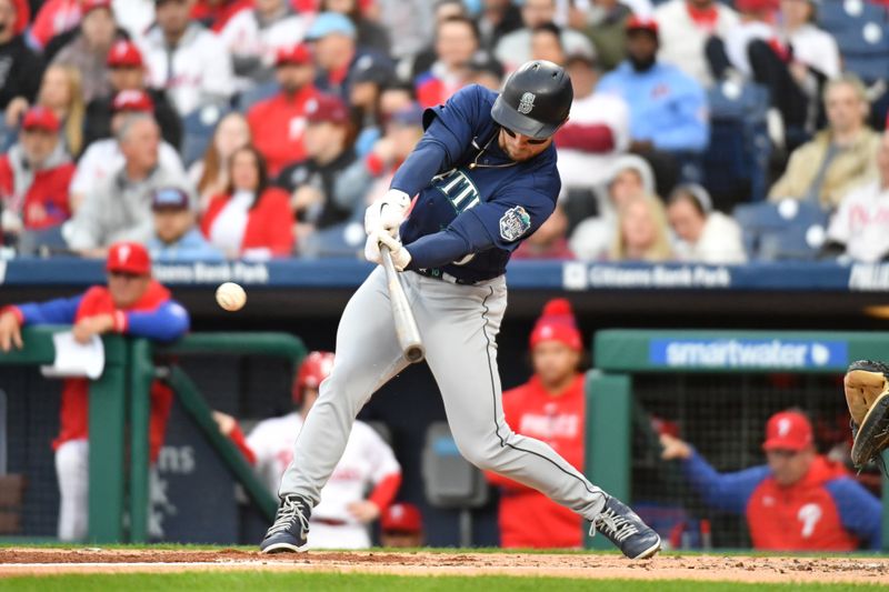 Apr 25, 2023; Philadelphia, Pennsylvania, USA; Seattle Mariners left fielder Jarred Kelenic (10) hits a double during the second inning against the Philadelphia Phillies at Citizens Bank Park. Mandatory Credit: Eric Hartline-USA TODAY Sports