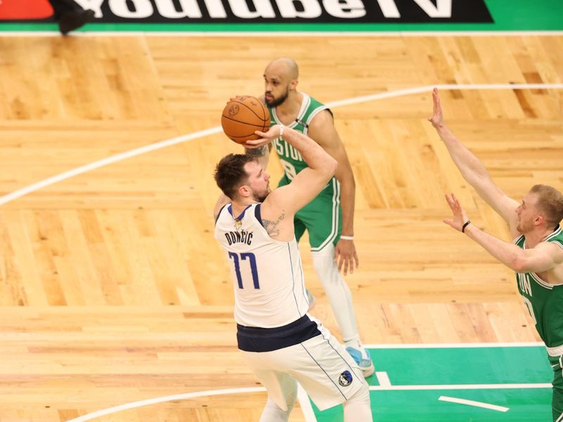 BOSTON, MA - JUNE 17: Luka Doncic #77 of the Dallas Mavericks shoots the ball during the game  against the Boston Celtics during Game 5 of the 2024 NBA Finals on June 17, 2024 at the TD Garden in Boston, Massachusetts. NOTE TO USER: User expressly acknowledges and agrees that, by downloading and or using this photograph, User is consenting to the terms and conditions of the Getty Images License Agreement. Mandatory Copyright Notice: Copyright 2024 NBAE  (Photo by Stephen Gosling/NBAE via Getty Images)