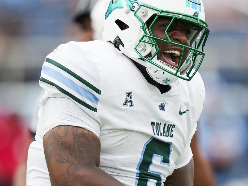 Nov 18, 2023; Boca Raton, Florida, USA;  Tulane Green Wave defensive lineman Darius Hodges (6) celebrates a sack against the Florida Atlantic Owls in the second half at FAU Stadium. Mandatory Credit: Jim Rassol-USA TODAY Sports