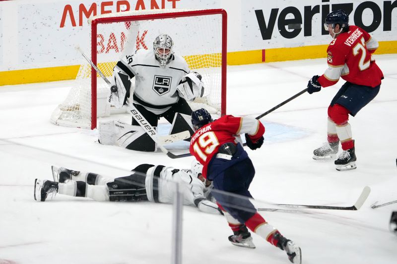 Jan 11, 2024; Sunrise, Florida, USA; Los Angeles Kings goaltender Cam Talbot (39) blocks the shot of Florida Panthers left wing Matthew Tkachuk (19) during the third period at Amerant Bank Arena. Mandatory Credit: Jasen Vinlove-USA TODAY Sports