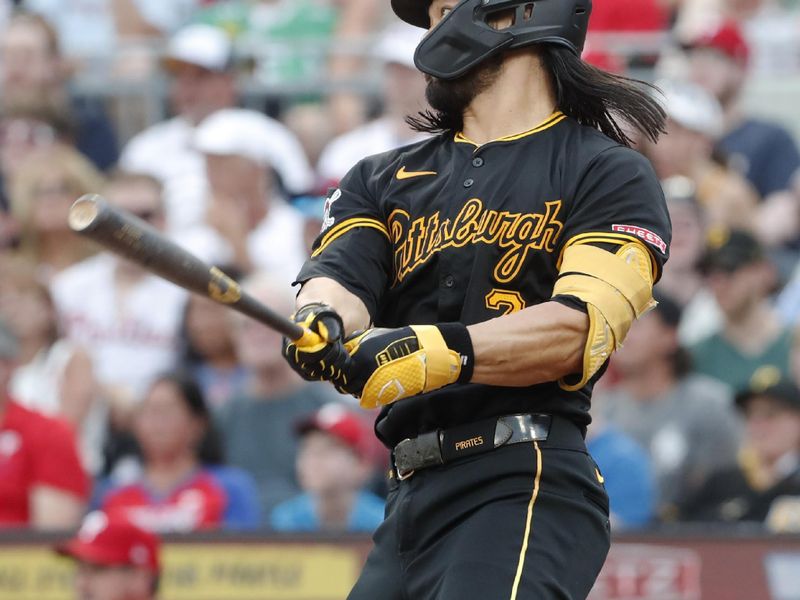 Jul 20, 2024; Pittsburgh, Pennsylvania, USA;  Pittsburgh Pirates first baseman Connor Joe (2) hits a double against the Philadelphia Phillies during the fourth inning at PNC Park. Mandatory Credit: Charles LeClaire-USA TODAY Sports