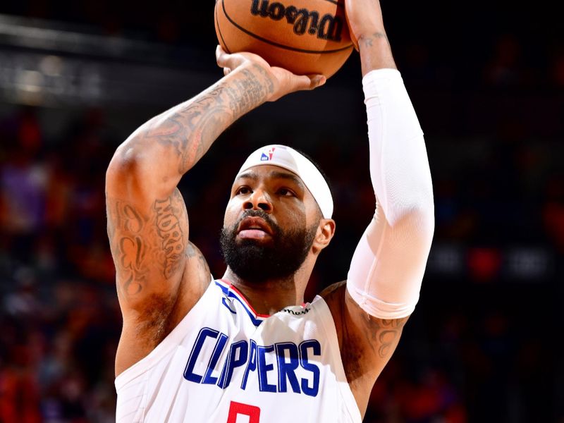 PHOENIX, AZ - APRIL 25: Marcus Morris Sr. #8 of the LA Clippers shoots a free throw during the game against the Phoenix Suns during Round 1 Game 5 of the 2023 NBA Playoffs on April 25, 2023 at Footprint Center in Phoenix, Arizona. NOTE TO USER: User expressly acknowledges and agrees that, by downloading and or using this photograph, user is consenting to the terms and conditions of the Getty Images License Agreement. Mandatory Copyright Notice: Copyright 2023 NBAE (Photo by Barry Gossage/NBAE via Getty Images)