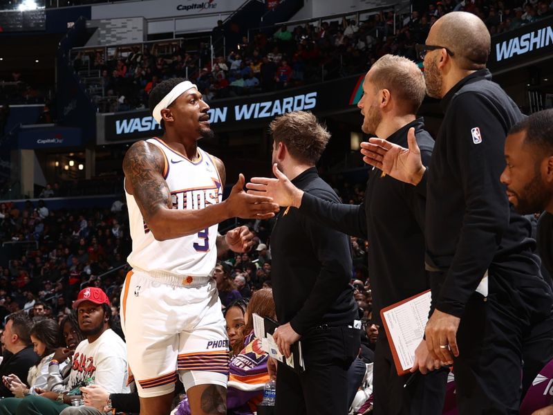 WASHINGTON, DC -? FEBRUARY 4: Bradley Beal #3 of the Phoenix Suns high fives his teammates during the game against the Washington Wizards on February 4, 2024 at Capital One Arena in Washington, DC. NOTE TO USER: User expressly acknowledges and agrees that, by downloading and or using this Photograph, user is consenting to the terms and conditions of the Getty Images License Agreement. Mandatory Copyright Notice: Copyright 2024 NBAE (Photo by Kenny Giarla/NBAE via Getty Images)