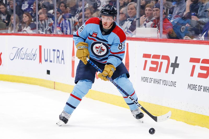 Jan 27, 2024; Winnipeg, Manitoba, CAN; \Winnipeg Jets defenseman Nate Schmidt (88) waits to pass in the first period against the Toronto Maple Leafs at Canada Life Centre. Mandatory Credit: James Carey Lauder-USA TODAY Sports