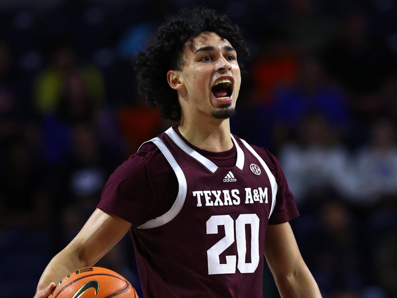 Jan 4, 2023; Gainesville, Florida, USA; Texas A&M Aggies guard Hayden Hefner (2) dribbles the ball against the Florida Gators during the first half at Exactech Arena at the Stephen C. O'Connell Center. Mandatory Credit: Kim Klement-USA TODAY Sports