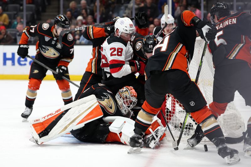 Mar 1, 2024; Anaheim, California, USA; Anaheim Ducks goaltender Lukas Dostal (1) protects the goal during the third period against the New Jersey Devils at Honda Center. Mandatory Credit: Kiyoshi Mio-USA TODAY Sports