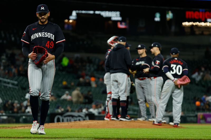 Apr 12, 2024; Detroit, Michigan, USA;  Minnesota Twins starting pitcher Pablo Lopez (49) walks off the field after being relieved in the fifth inning against the Detroit Tigers at Comerica Park. Mandatory Credit: Rick Osentoski-USA TODAY Sports