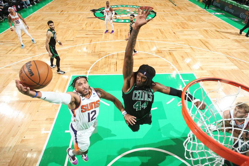 BOSTON, MA - FEBRUARY 3: Ish Wainright #12 of the Phoenix Suns drives to the basket during the game against the Boston Celtics on February 3, 2023 at TD Garden in Boston, Massachusetts.  NOTE TO USER: User expressly acknowledges and agrees that, by downloading and or using this photograph, User is consenting to the terms and conditions of the Getty Images License Agreement. Mandatory Copyright Notice: Copyright 2022 NBAE  (Photo by Nathaniel S. Butler/NBAE via Getty Images)