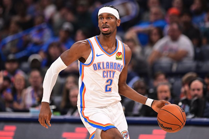 OKLAHOMA CITY, OKLAHOMA - OCTOBER 27: Shai Gilgeous-Alexander #2 of the Oklahoma City Thunder handles the ball during the first half against the Atlanta Hawks at Paycom Center on October 27, 2024 in Oklahoma City, Oklahoma. NOTE TO USER: User expressly acknowledges and agrees that, by downloading and or using this photograph, User is consenting to the terms and conditions of the Getty Images License Agreement. (Photo by Joshua Gateley/Getty Images)