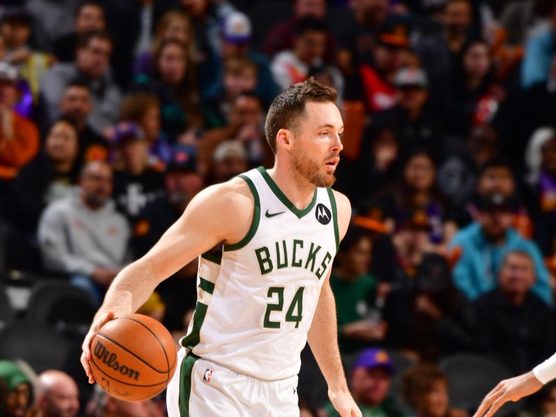 PHOENIX, AZ - FEBRUARY 6:  Pat Connaughton #24 of the Milwaukee Bucks handles the ball during the game  on February 6, 2024 at Footprint Center in Phoenix, Arizona. NOTE TO USER: User expressly acknowledges and agrees that, by downloading and or using this photograph, user is consenting to the terms and conditions of the Getty Images License Agreement. Mandatory Copyright Notice: Copyright 2024 NBAE (Photo by Barry Gossage/NBAE via Getty Images)