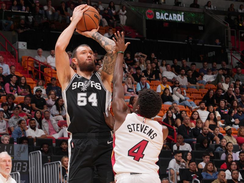 MIAMI, FL - OCTOBER 15: Sandro Mamukelashvili #54 of the San Antonio Spurs shoots the ball during the game against the Miami Heat during a NBA preseason game on October 15, 2024 at Kaseya Center in Miami, Florida. NOTE TO USER: User expressly acknowledges and agrees that, by downloading and or using this Photograph, user is consenting to the terms and conditions of the Getty Images License Agreement. Mandatory Copyright Notice: Copyright 2024 NBAE (Photo by Jesse D. Garrabrant/NBAE via Getty Images)