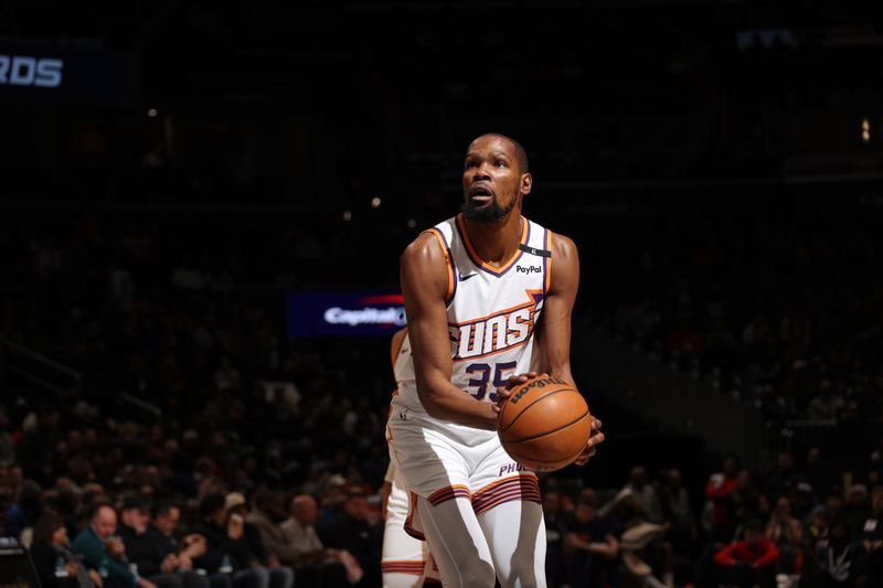 WASHINGTON, DC -?JANUARY 16 : Kevin Durant #35 of the Phoenix Suns shoots a free throw during the game against the Washington Wizards on January 16, 2025 at Capital One Arena in Washington, DC. NOTE TO USER: User expressly acknowledges and agrees that, by downloading and or using this Photograph, user is consenting to the terms and conditions of the Getty Images License Agreement. Mandatory Copyright Notice: Copyright 2024 NBAE (Photo by Stephen Gosling/NBAE via Getty Images)