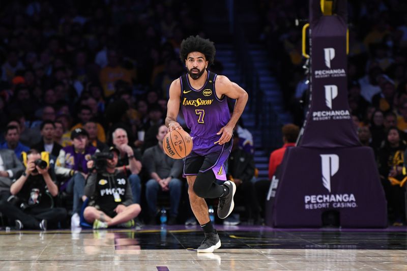 LOS ANGELES, CA - JANUARY 13: Gabe Vincent #7 of the Los Angeles Lakers dribbles the ball during the game against the San Antonio Spurs on January 13, 2025 at Crypto.Com Arena in Los Angeles, California. NOTE TO USER: User expressly acknowledges and agrees that, by downloading and/or using this Photograph, user is consenting to the terms and conditions of the Getty Images License Agreement. Mandatory Copyright Notice: Copyright 2025 NBAE (Photo by Noah Graham/NBAE via Getty Images)