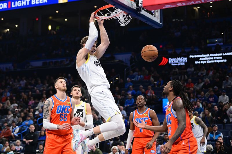 OKLAHOMA CITY, OKLAHOMA - DECEMBER 3: Lauri Markkanen #23 of the Utah Jazz finished a dunk during the first half against the Oklahoma City Thunder at Paycom Center on December 3, 2024 in Oklahoma City, Oklahoma. NOTE TO USER: User expressly acknowledges and agrees that, by downloading and or using this photograph, User is consenting to the terms and conditions of the Getty Images License Agreement. (Photo by Joshua Gateley/Getty Images)