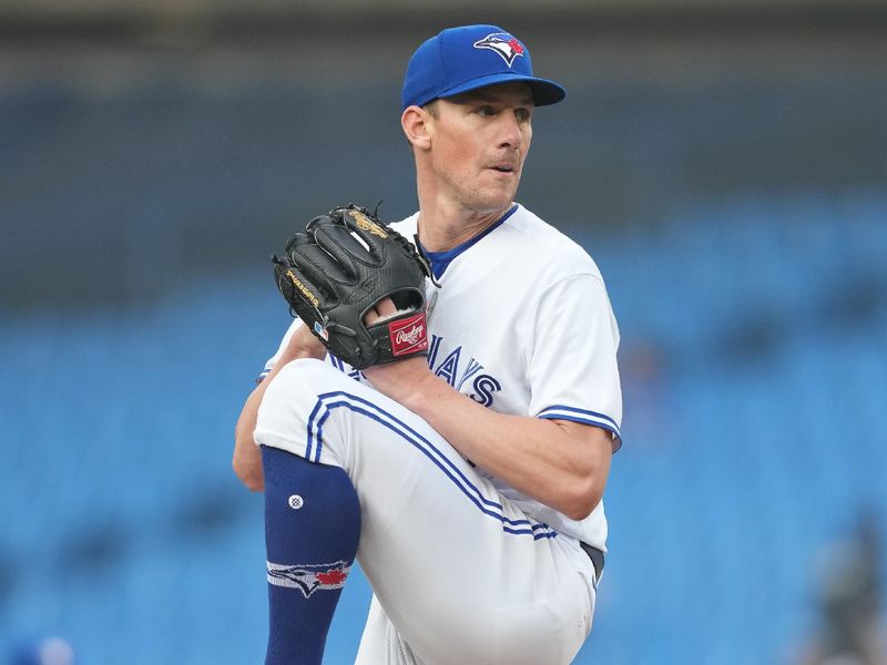 Jun 29, 2023; Toronto, Ontario, CAN; Toronto Blue Jays starting pitcher Chris Bassitt (40) throws a pitch against the San Francisco Giants during the first inning at Rogers Centre. Mandatory Credit: Nick Turchiaro-USA TODAY Sports
