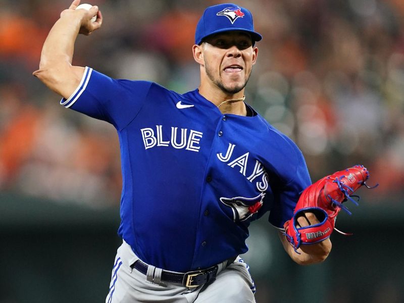 Aug 24, 2023; Baltimore, Maryland, USA; Toronto Blue Jays  pitcher Jose Berrios (17) delivers in them first inning against the Baltimore Orioles at Oriole Park at Camden Yards. Mandatory Credit: Mitch Stringer-USA TODAY Sports