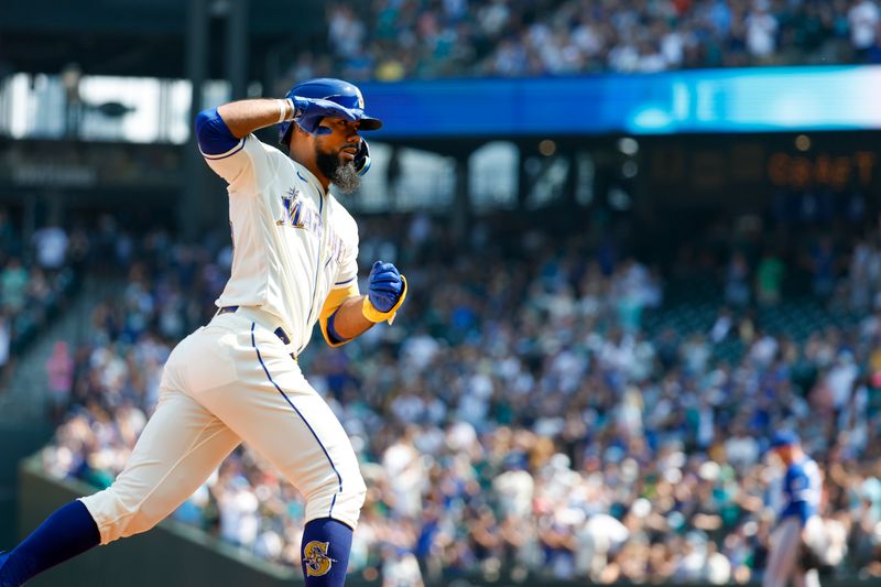 Aug 27, 2023; Seattle, Washington, USA; Seattle Mariners designated hitter Teoscar Hernandez (35) runs the bases after hitting a solo-home run against the Kansas City Royals during the second inning at T-Mobile Park. Mandatory Credit: Joe Nicholson-USA TODAY Sports