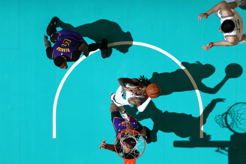 MEMPHIS, TN - NOVEMBER 6: Ja Morant #12 of the Memphis Grizzlies shoots the ball during the game against the Los Angeles Lakers on November 6, 2024 at FedExForum in Memphis, Tennessee. NOTE TO USER: User expressly acknowledges and agrees that, by downloading and or using this photograph, User is consenting to the terms and conditions of the Getty Images License Agreement. Mandatory Copyright Notice: Copyright 2024 NBAE (Photo by Joe Murphy/NBAE via Getty Images)