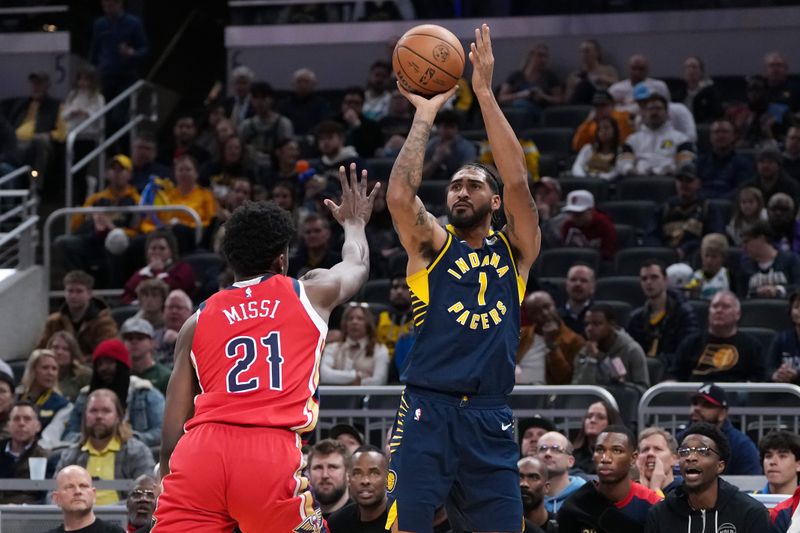 INDIANAPOLIS, INDIANA - NOVEMBER 25: Obi Toppin #1 of the Indiana Pacers attempts a shot while being guarded by Yves Missi #21 of the New Orleans Pelicans in the second quarter at Gainbridge Fieldhouse on November 25, 2024 in Indianapolis, Indiana. NOTE TO USER: User expressly acknowledges and agrees that, by downloading and or using this photograph, User is consenting to the terms and conditions of the Getty Images License Agreement. (Photo by Dylan Buell/Getty Images)