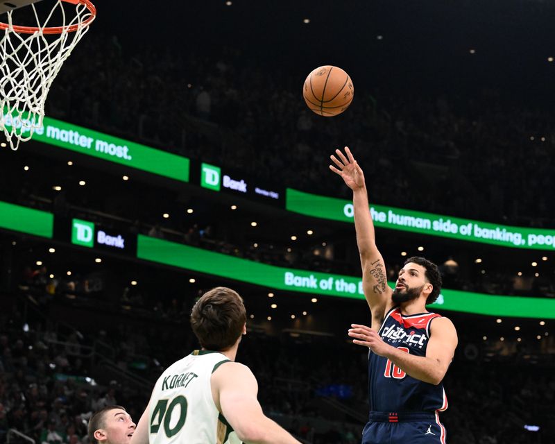 BOSTON, MASSACHUSETTS - APRIL 14: Anthony Gill #16 of the Washington Wizards shoots against the Boston Celtics during the first quarter at the TD Garden on April 14, 2024 in Boston, Massachusetts. NOTE TO USER: User expressly acknowledges and agrees that, by downloading and or using this photograph, User is consenting to the terms and conditions of the Getty Images License Agreement. (Photo by Brian Fluharty/Getty Images)