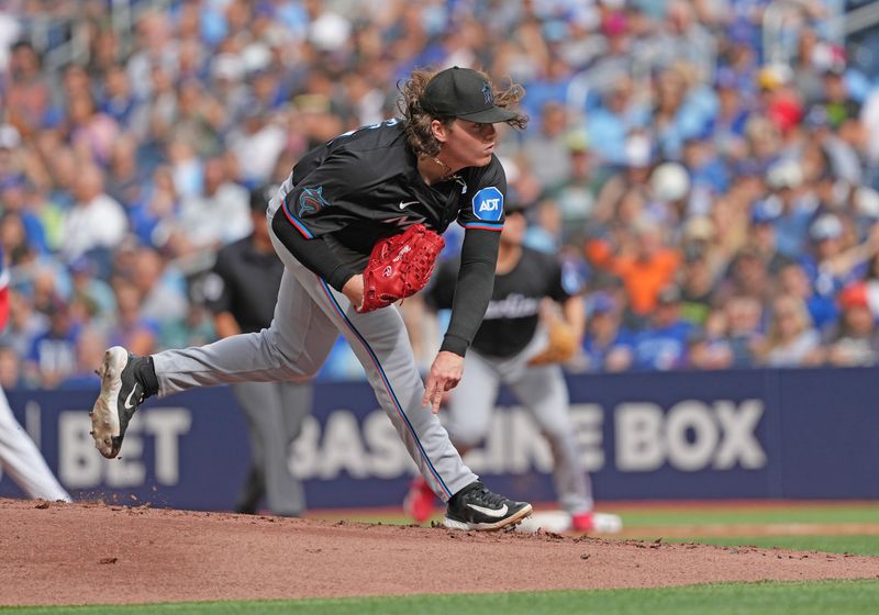 Sep 29, 2024; Toronto, Ontario, CAN; Miami Marlins starting pitcher Ryan Weathers (60) throws pitch against the Toronto Blue Jays during the first inning at Rogers Centre. Mandatory Credit: Nick Turchiaro-Imagn Images