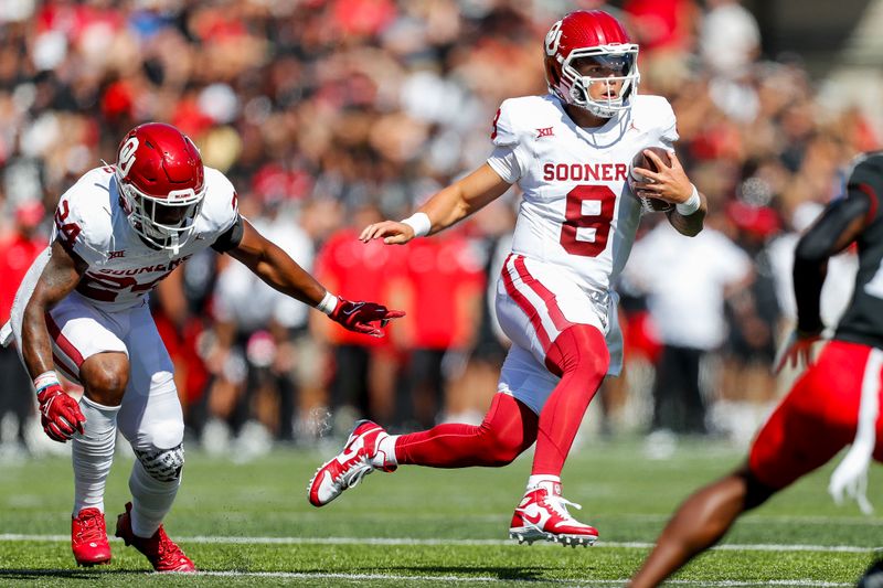 Sep 23, 2023; Cincinnati, Ohio, USA; Oklahoma Sooners quarterback Dillon Gabriel (8) runs with the ball against the Cincinnati Bearcats in the first half at Nippert Stadium. Mandatory Credit: Katie Stratman-USA TODAY Sports