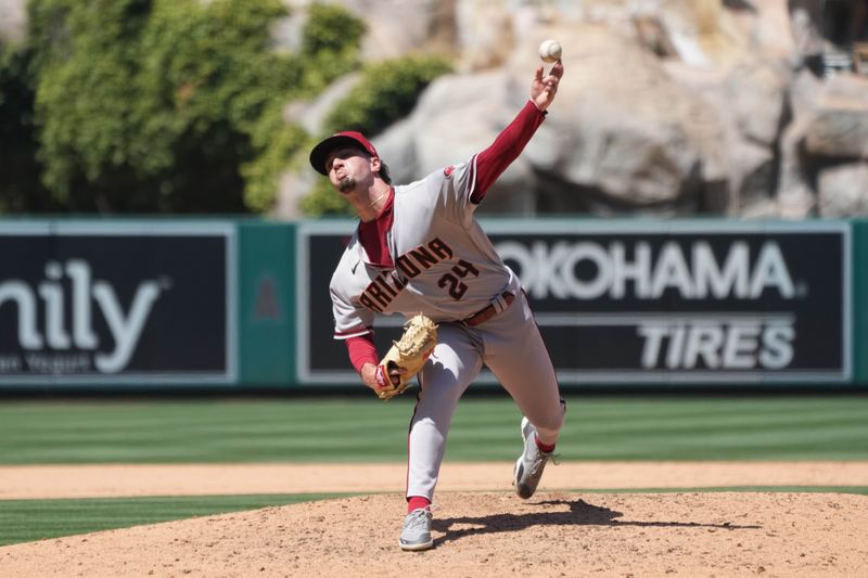 Jul 2, 2023; Anaheim, California, USA; Arizona Diamondbacks relief pitcher Kyle Nelson (24) throws in the eighth inning against the Los Angeles Angels at Angel Stadium. Mandatory Credit: Kirby Lee-USA TODAY Sports