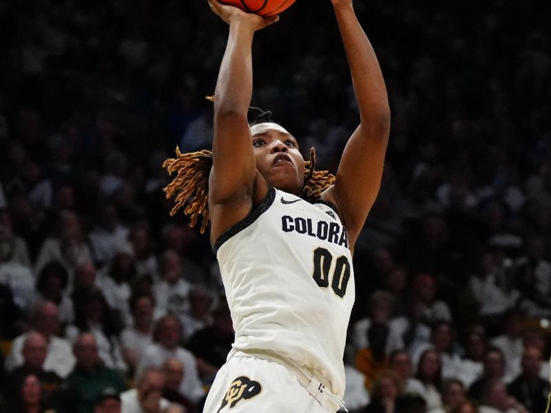 Jan 19, 2024; Boulder, Colorado, USA; Colorado Buffaloes guard Jaylyn Sherrod (00) shoots the ball in the second half against the UCLA Bruins at the CU Events Center. Mandatory Credit: Ron Chenoy-USA TODAY Sports
\v11