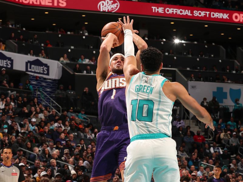 CHARLOTTE, NC - JANUARY 7: Devin Booker #1 of the Phoenix Suns shoots the ball during the game against the Charlotte Hornets on January 7, 2025 at Spectrum Center in Charlotte, North Carolina. NOTE TO USER: User expressly acknowledges and agrees that, by downloading and or using this photograph, User is consenting to the terms and conditions of the Getty Images License Agreement. Mandatory Copyright Notice: Copyright 2025 NBAE (Photo by Kent Smith/NBAE via Getty Images)