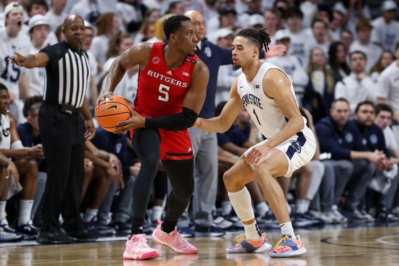 Feb 26, 2023; University Park, Pennsylvania, USA; Rutgers Scarlet Knights forward Aundre Hyatt (5) holds the ball as Penn State Nittany Lions guard/forward Seth Lundy (1) defends during the first half at Bryce Jordan Center. Mandatory Credit: Matthew OHaren-USA TODAY Sports