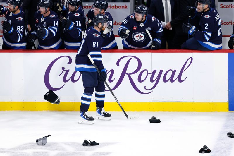 Oct 9, 2025; Winnipeg, Manitoba, CAN; Winnipeg Jets left wing Kyle Connor (81) celebrates his third goal of the game against the Dallas Stars in the third period at Canada Life Centre. Mandatory Credit: James Carey Lauder-Imagn Images