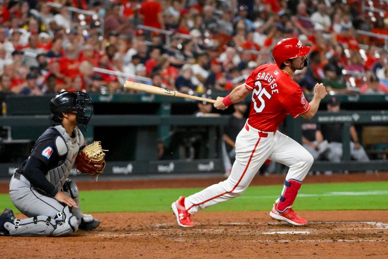 Sep 20, 2024; St. Louis, Missouri, USA;  St. Louis Cardinals third baseman Thomas Saggese (25) hits a single against the Cleveland Guardians during the seventh inning at Busch Stadium. Mandatory Credit: Jeff Curry-Imagn Images