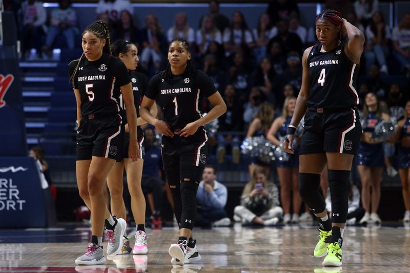 Feb 19, 2023; Oxford, Mississippi, USA; South Carolina Gamecocks players walk back on to the court during the first half against the Mississippi Rebels at The Sandy and John Black Pavilion at Ole Miss. Mandatory Credit: Petre Thomas-USA TODAY Sports