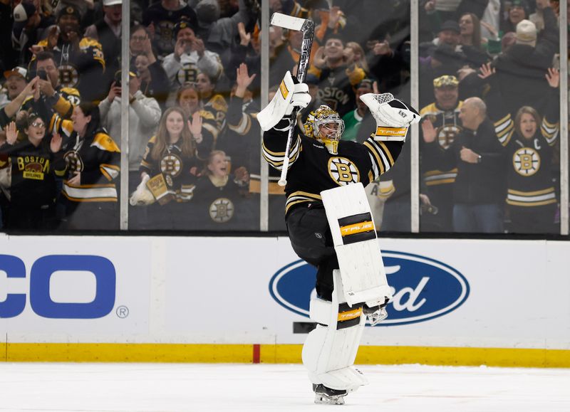 Feb 19, 2024; Boston, Massachusetts, USA; Boston Bruins goaltender Jeremy Swayman (1) celebrates after stopping the last shot in the shootout for a 4-3 win over the Dallas Stars at TD Garden. Mandatory Credit: Winslow Townson-USA TODAY Sports