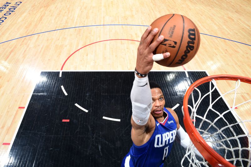 LOS ANGELES, CA - MARCH 27: Russell Westbrook  #0 of the LA Clippers drives to the basket during the game against the Chicago Bulls on March 27, 2023 at Crypto.Com Arena in Los Angeles, California. NOTE TO USER: User expressly acknowledges and agrees that, by downloading and/or using this Photograph, user is consenting to the terms and conditions of the Getty Images License Agreement. Mandatory Copyright Notice: Copyright 2023 NBAE (Photo by Adam Pantozzi/NBAE via Getty Images)