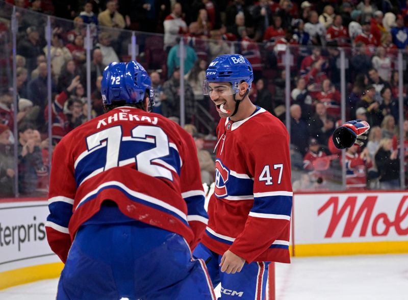 Nov 22, 2025; Montreal, Quebec, CAN; Montreal Canadiens defenseman Arber Xhekaj (72) and teammate defenseman Jayden Struble (47) celebrate the win against the Toronto Maple Leafs at the Bell Centre. Mandatory Credit: Eric Bolte-Imagn Images