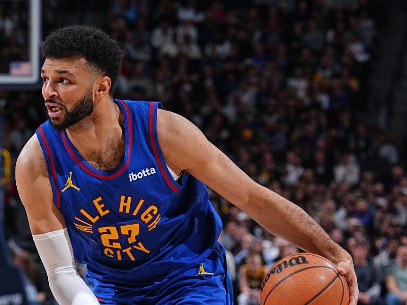 DENVER, CO - JANUARY 12: Jamal Murray #27 of the Denver Nuggets dribbles the ball during the game against the New Orleans Pelicans on January 12, 2024 at the Ball Arena in Denver, Colorado. NOTE TO USER: User expressly acknowledges and agrees that, by downloading and/or using this Photograph, user is consenting to the terms and conditions of the Getty Images License Agreement. Mandatory Copyright Notice: Copyright 2024 NBAE (Photo by Garrett Ellwood/NBAE via Getty Images)