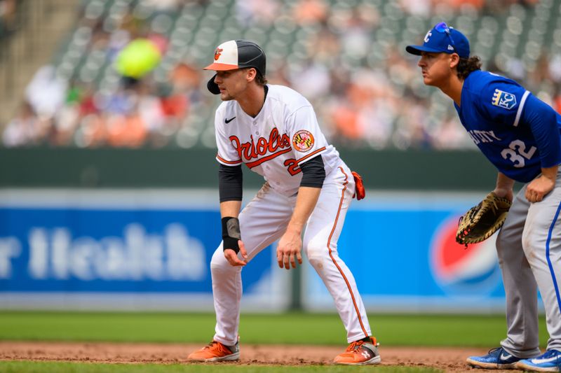 Jun 11, 2023; Baltimore, Maryland, USA; Baltimore Orioles third baseman Gunnar Henderson (2) takes a lead off of first base while Kansas City Royals first baseman Nick Pratto (32) looks on during the sixth inning at Oriole Park at Camden Yards. Mandatory Credit: Reggie Hildred-USA TODAY Sports