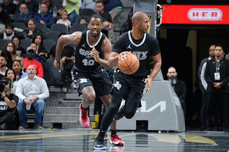 SAN ANTONIO, TX - NOVEMBER 19: Chris Paul #3 of the San Antonio Spurs dribbles the ball during the game against the Oklahoma City Thunder during the Emirates NBA Cup game on November 19, 2024 at the Frost Bank Center in San Antonio, Texas. NOTE TO USER: User expressly acknowledges and agrees that, by downloading and or using this photograph, user is consenting to the terms and conditions of the Getty Images License Agreement. Mandatory Copyright Notice: Copyright 2024 NBAE (Photos by Michael Gonzales/NBAE via Getty Images)