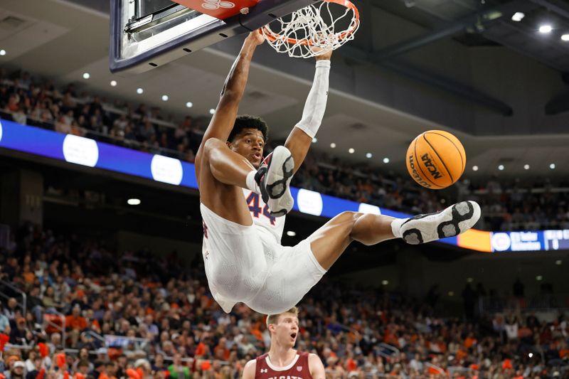 Dec 2, 2022; Auburn, Alabama, USA;  Auburn Tigers center Dylan Cardwell (44) makes a dunk on the Colgate Raiders during the second half at Neville Arena. Mandatory Credit: John Reed-USA TODAY Sports