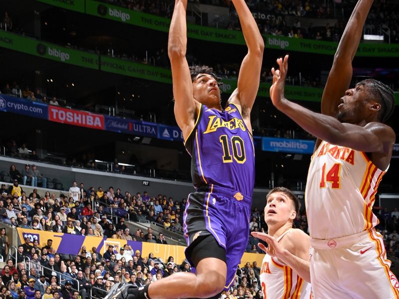 LOS ANGELES, CA - JANUARY 6: Max Christie #10 of the Los Angeles Lakers drives to the basket during the game against the Atlanta Hawks on January 6, 2023 at Crypto.Com Arena in Los Angeles, California. NOTE TO USER: User expressly acknowledges and agrees that, by downloading and/or using this Photograph, user is consenting to the terms and conditions of the Getty Images License Agreement. Mandatory Copyright Notice: Copyright 2023 NBAE (Photo by Andrew D. Bernstein/NBAE via Getty Images)