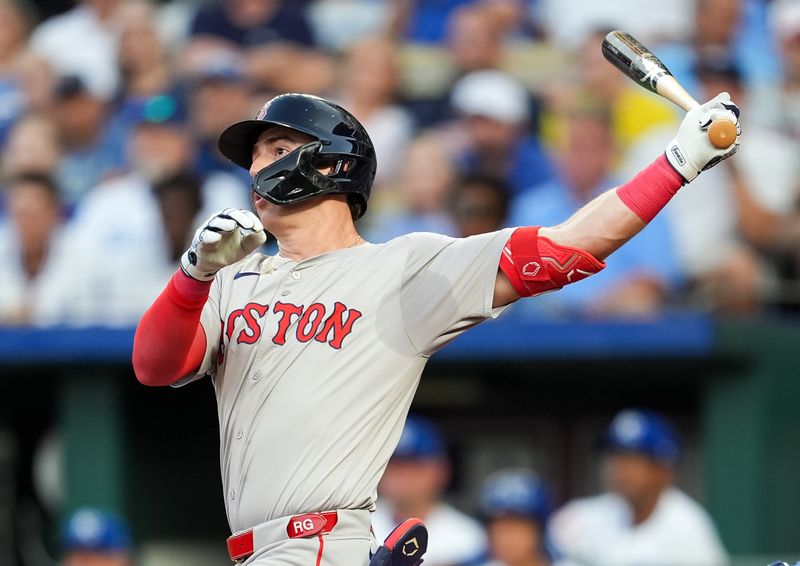 Aug 7, 2024; Kansas City, Missouri, USA; Boston Red Sox second baseman Romy Gonzalez (23) hits a home run during the third inning against the Kansas City Royals at Kauffman Stadium. Mandatory Credit: Jay Biggerstaff-USA TODAY Sports