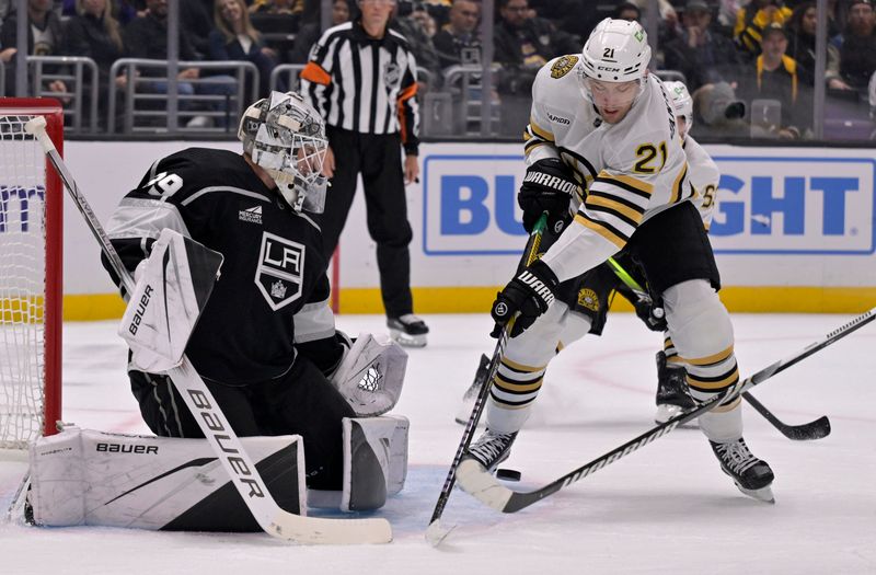 Oct 21, 2023; Los Angeles, California, USA; Los Angeles Kings goaltender Cam Talbot (39) stops a shot against Boston Bruins left wing James van Riemsdyk (21) during the first period at Crypto.com Arena. Mandatory Credit: Alex Gallardo-USA TODAY Sports