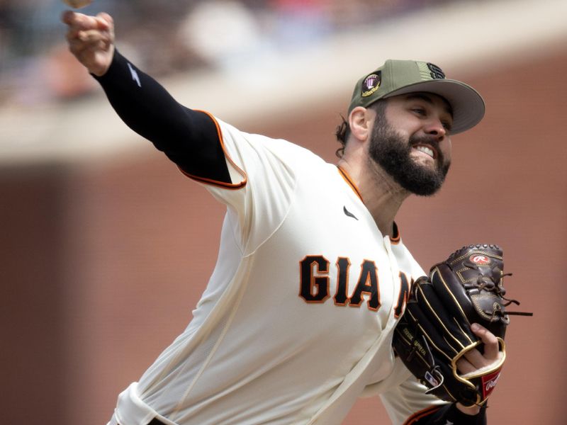 May 20, 2023; San Francisco, California, USA; San Francisco Giants pitcher Jakob Junis delivers a pitch against the Miami Marlins during the seventh inning at Oracle Park. Mandatory Credit: D. Ross Cameron-USA TODAY Sports