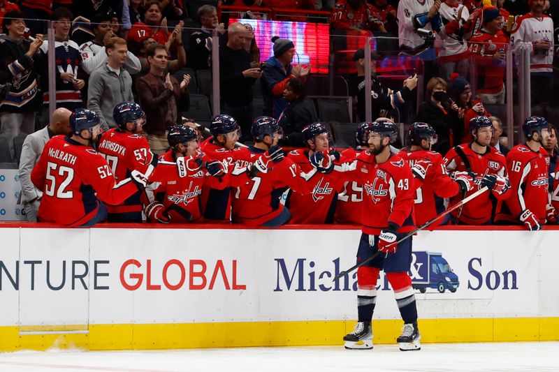 Oct 17, 2024; Washington, District of Columbia, USA; Washington Capitals right wing Tom Wilson (43) celebrates with teammates after scoring a goal against the Dallas Stars in the second period at Capital One Arena. Mandatory Credit: Geoff Burke-Imagn Images