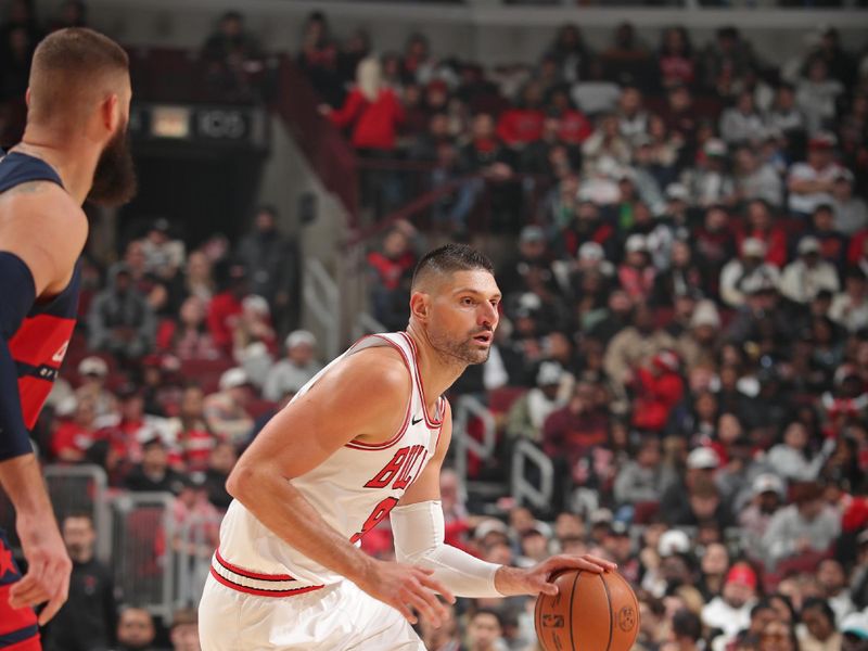 CHICAGO, IL - JANUARY 10: Nikola Vucevic #9 of the Chicago Bulls dribbles the ball during the game against the Washington Wizards on January 10, 2025 at United Center in Chicago, Illinois. NOTE TO USER: User expressly acknowledges and agrees that, by downloading and or using this photograph, User is consenting to the terms and conditions of the Getty Images License Agreement. Mandatory Copyright Notice: Copyright 2024 NBAE (Photo by Gary Dineen/NBAE via Getty Images)