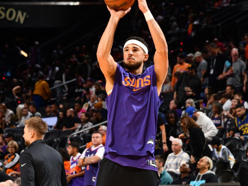 PHOENIX, AZ - NOVEMBER 30: Devin Booker #1 of the Phoenix Suns warms up before the game against the Golden State Warriors on November 30, 2024 at Footprint Center in Phoenix, Arizona. NOTE TO USER: User expressly acknowledges and agrees that, by downloading and or using this photograph, user is consenting to the terms and conditions of the Getty Images License Agreement. Mandatory Copyright Notice: Copyright 2024 NBAE (Photo by Barry Gossage/NBAE via Getty Images)