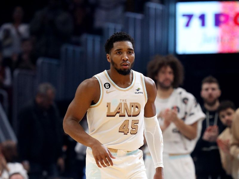 CLEVELAND, OH - JANUARY 4: Donovan Mitchell #45 of the Cleveland Cavaliers looks on during the game against the Phoenix Suns on January 4, 2023 at Rocket Mortgage FieldHouse in Cleveland, Ohio. NOTE TO USER: User expressly acknowledges and agrees that, by downloading and/or using this Photograph, user is consenting to the terms and conditions of the Getty Images License Agreement. Mandatory Copyright Notice: Copyright 2022 NBAE (Photo by  Lauren Bacho/NBAE via Getty Images)